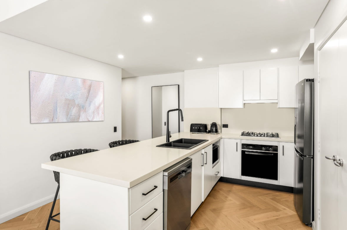 Warm Beige Herringbone Timber Flooring